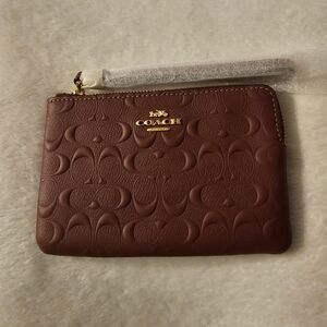 Coach Embossed Leather Wristlet in Deep Brown